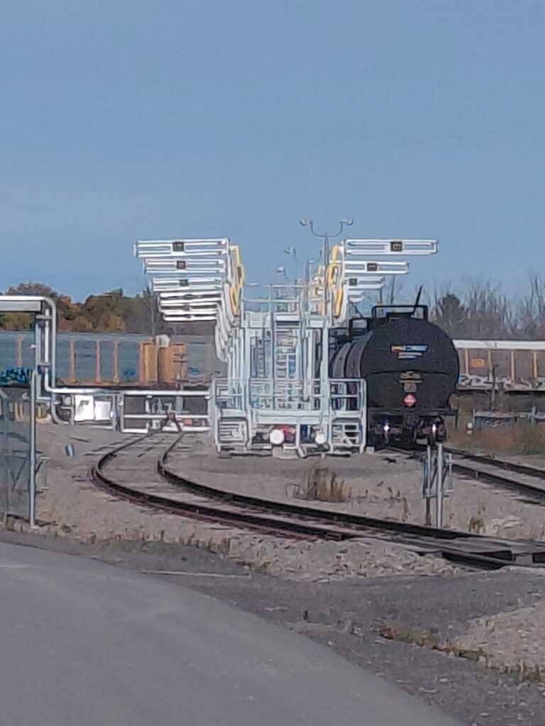 Multi-platform railcar unloading system engineered for simultaneous access across all unloading positions.